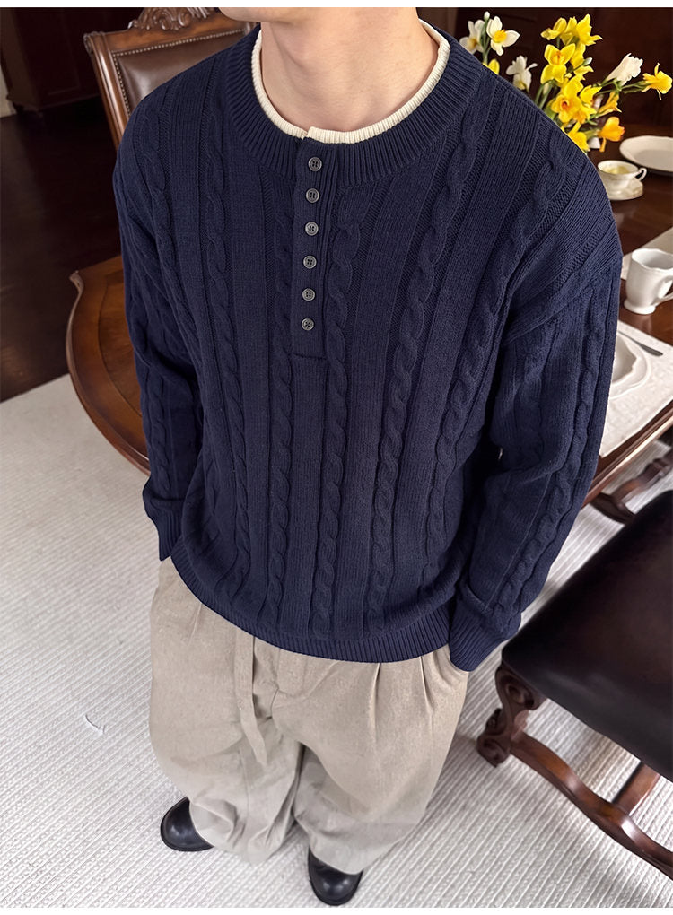 Layered henley knit sweater, angled view of the navy sweater