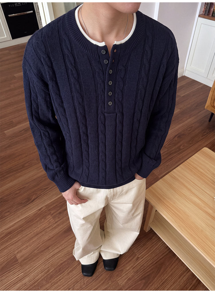 Layered henley knit sweater, front view showing the contrast neckline