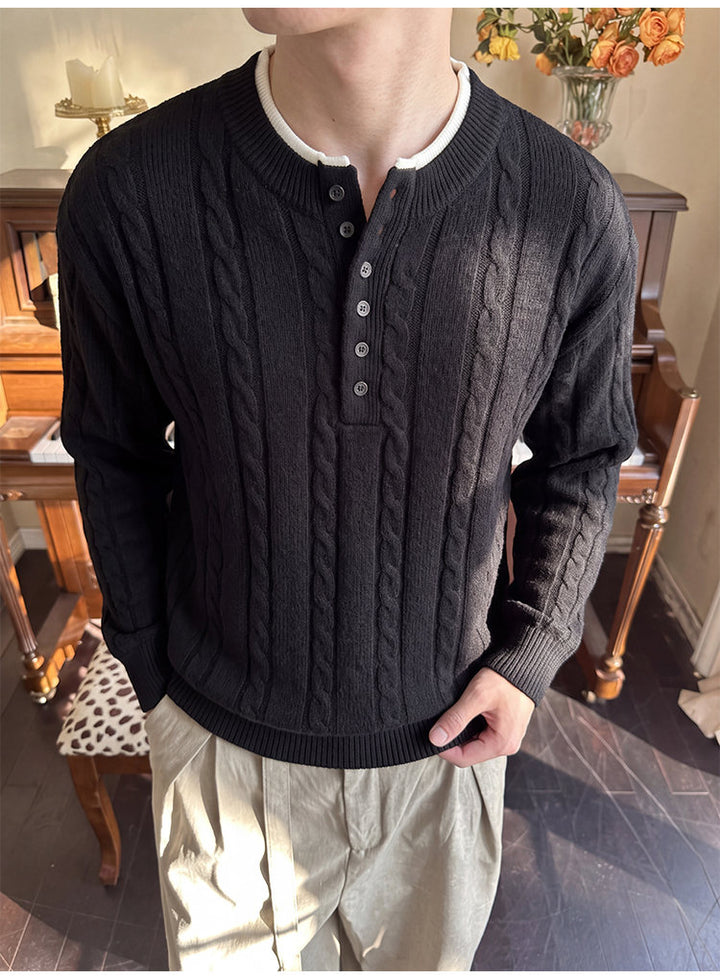 Layered henley knit sweater, angled view of the black sweater
