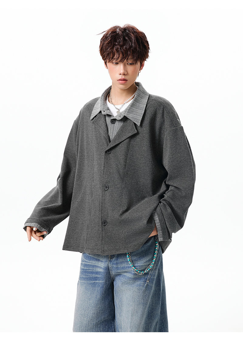 Layered lapel jacket, angled view of the charcoal jacket