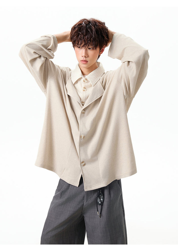 Layered lapel jacket, angled view with a shoulder bag