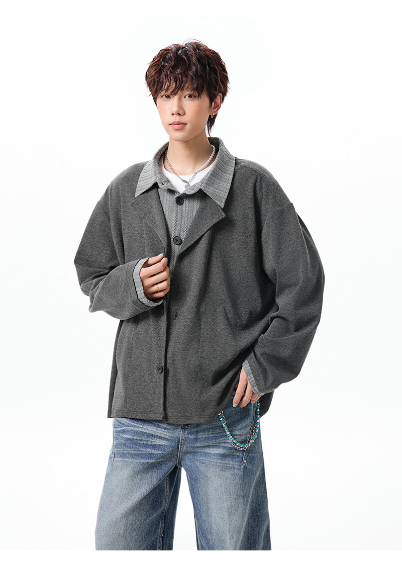 Layered lapel jacket, front view showing the charcoal lapel