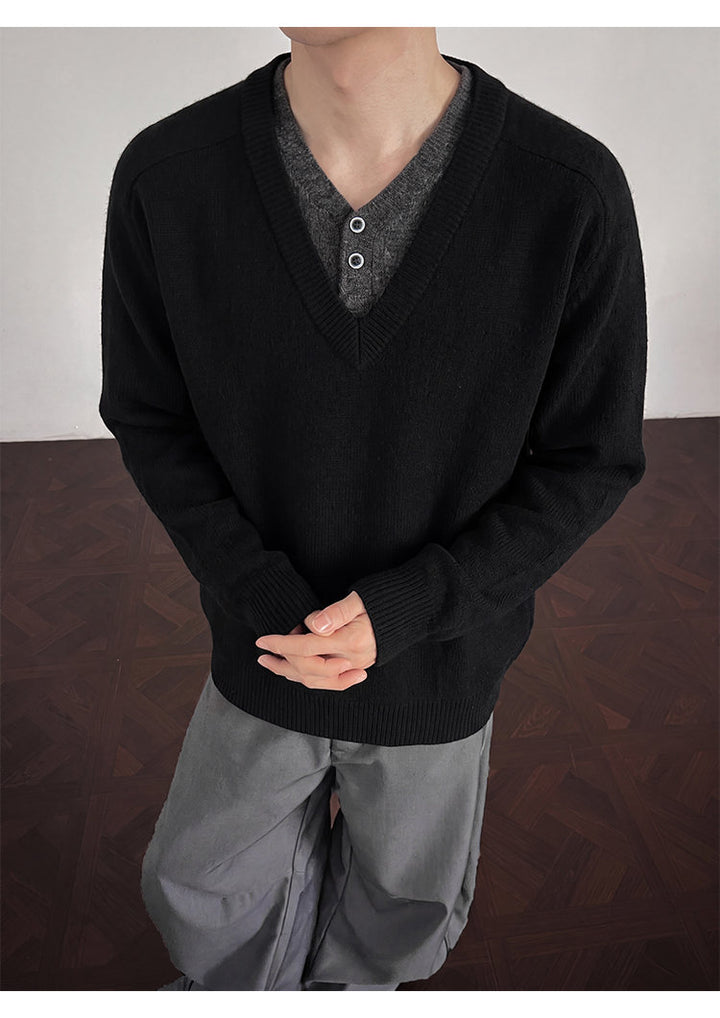 Layered V-neck knit sweater, front view of the black sweater