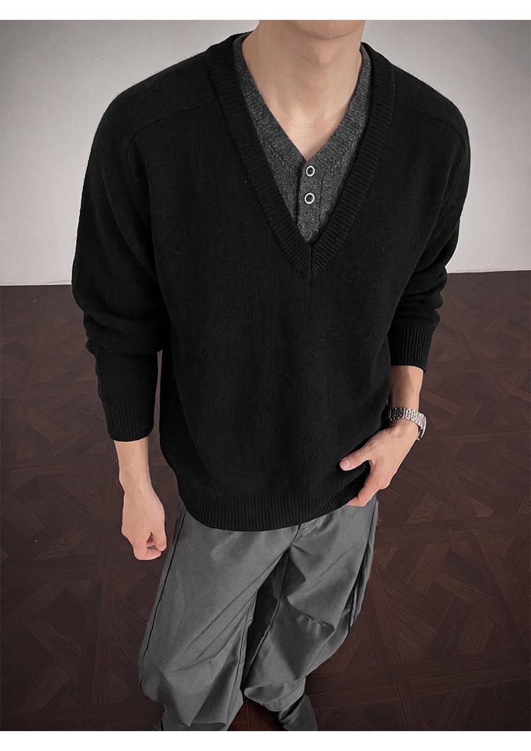 Layered V-neck knit sweater, front view showing the V-neck trim