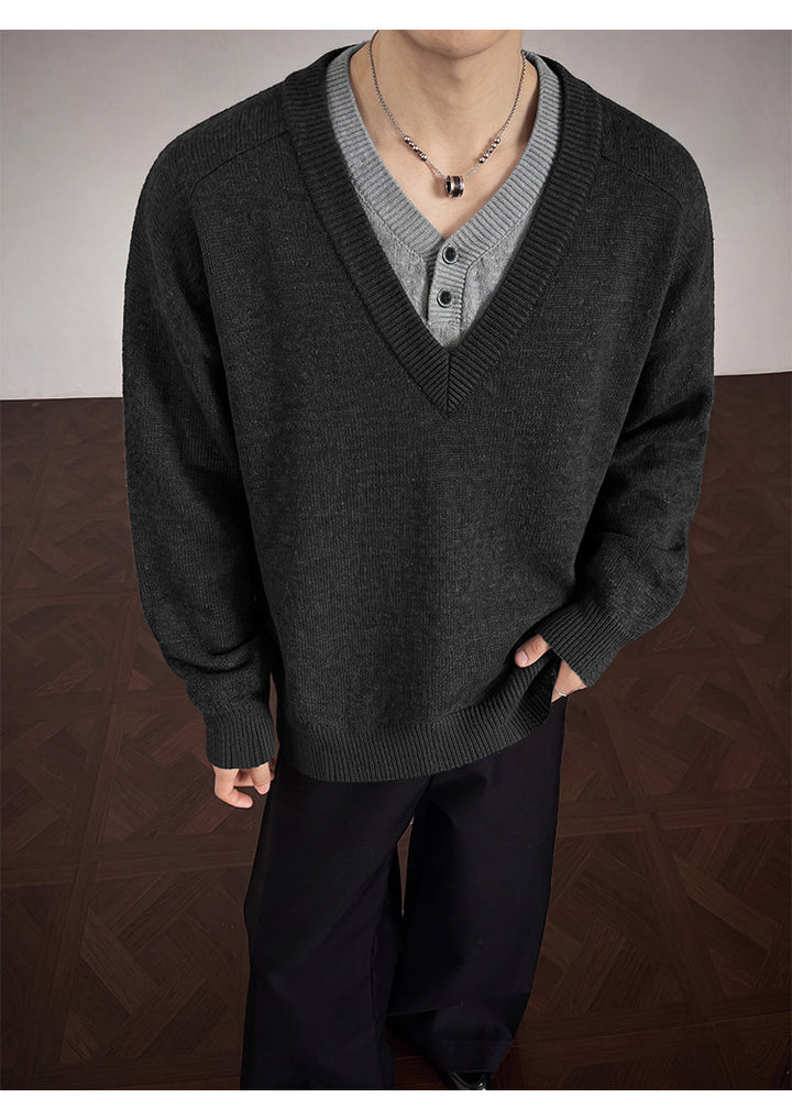Layered V-neck knit sweater, front view of the charcoal V-neck