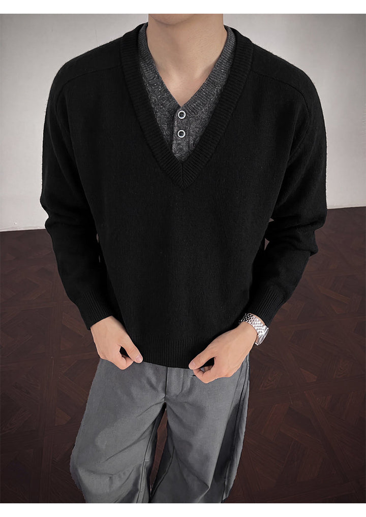 Layered V-neck knit sweater, front view of the black V-neck