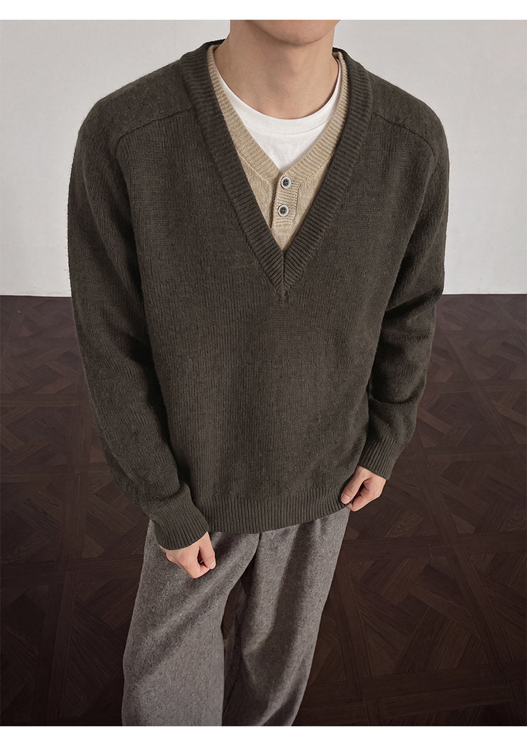 Layered V-neck knit sweater, front view showing the brown neckline