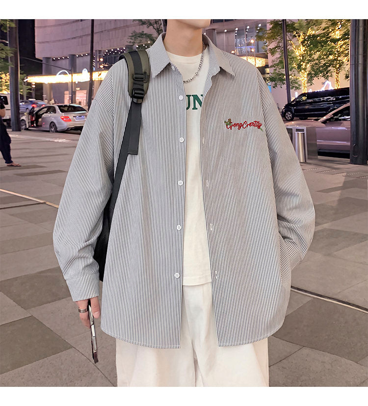 Letter-embroidered shirt, front view of the gray colorway