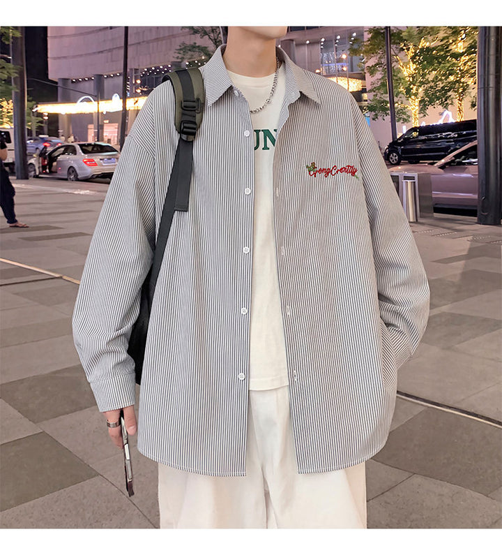 Letter-embroidered shirt, front view of the gray colorway