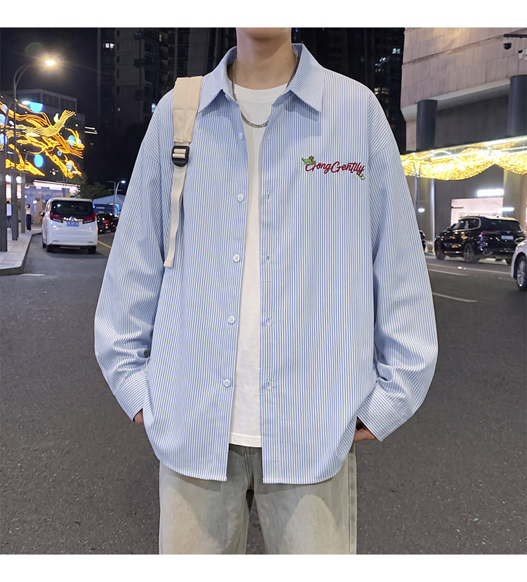 Letter-embroidered shirt, front view showing the chest embroidery