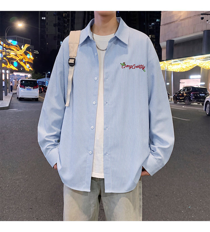 Letter-embroidered shirt, front view showing the chest embroidery