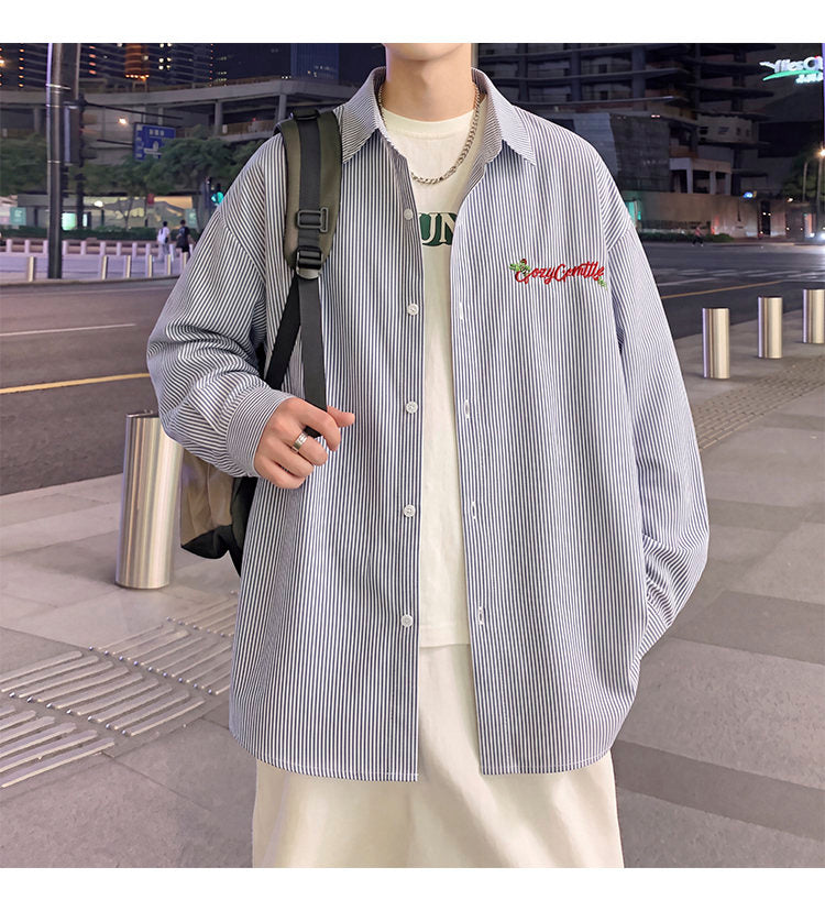 Letter-embroidered shirt, front view with a backpack at night
