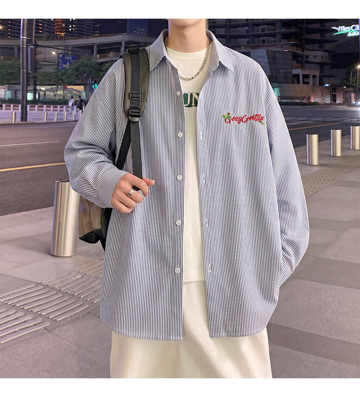 Letter-embroidered shirt, front view with a backpack at night