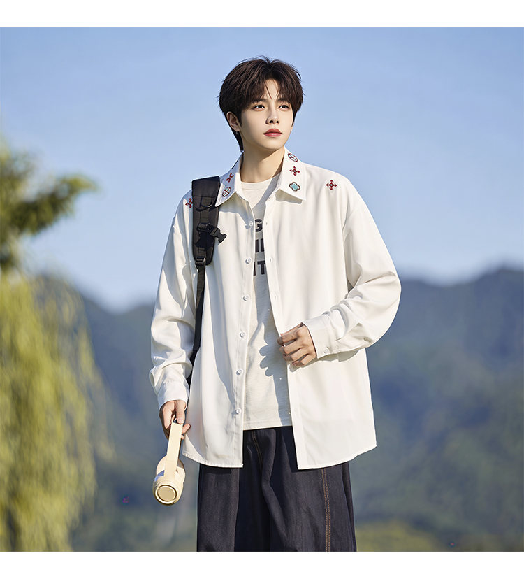 Minimal-embroidered shirt, angled view of the white embroidered shirt