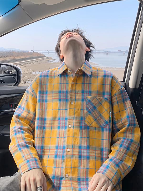 Oversized plaid flannel shirt, front view showing the yellow and blue plaid