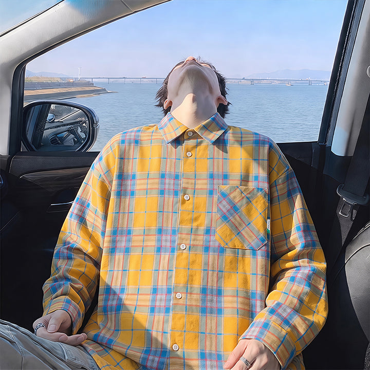 Oversized plaid flannel shirt, front view showing the long sleeves
