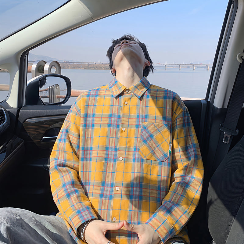 Oversized plaid flannel shirt, front view showing the chest pocket