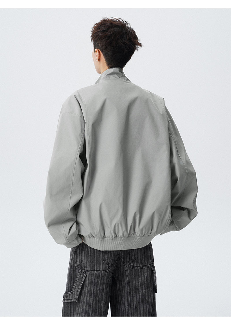 Paneled stand-collar jacket, back view of the gray jacket