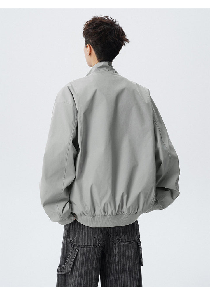 Paneled stand-collar jacket, back view of the gray jacket