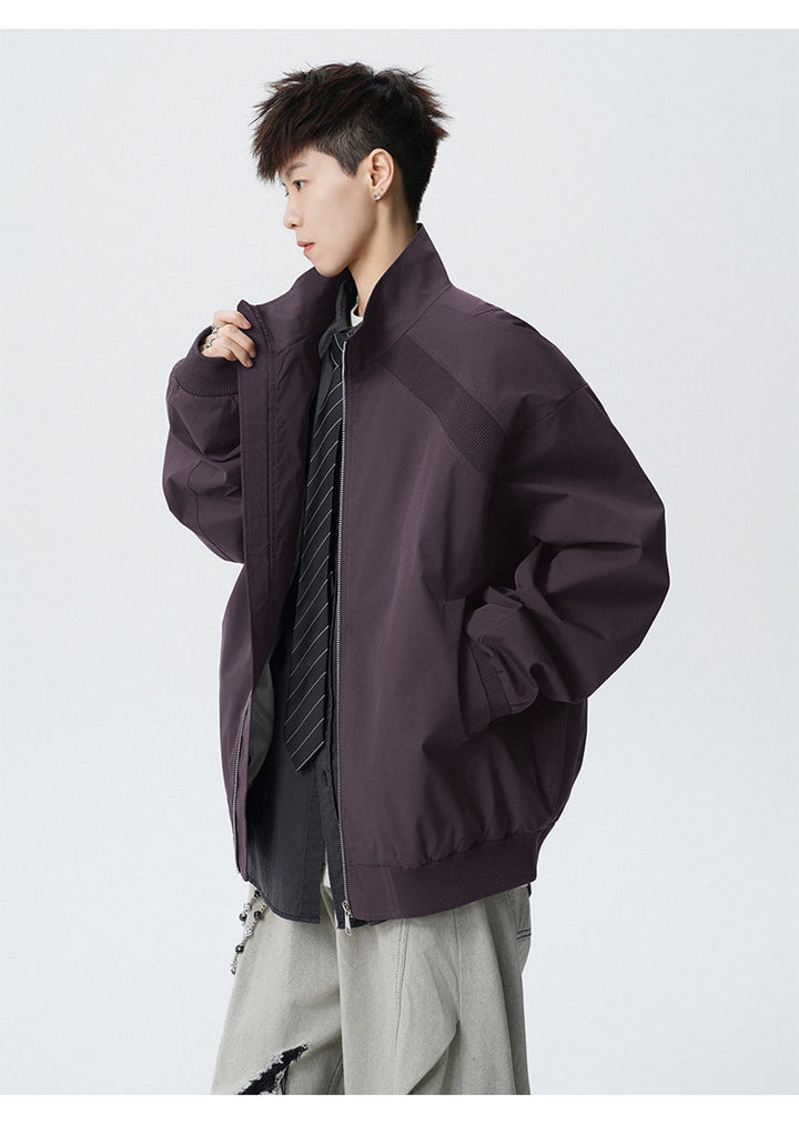 Paneled stand-collar jacket, front view of the purple jacket