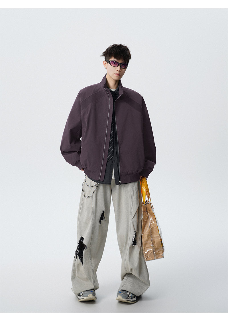 Paneled stand-collar jacket, front view of the black jacket