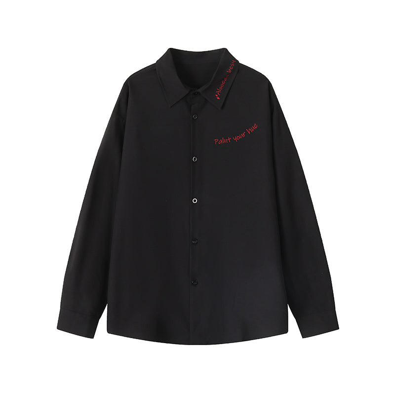 Script-embroidered shirt, flat-lay view of the black script shirt