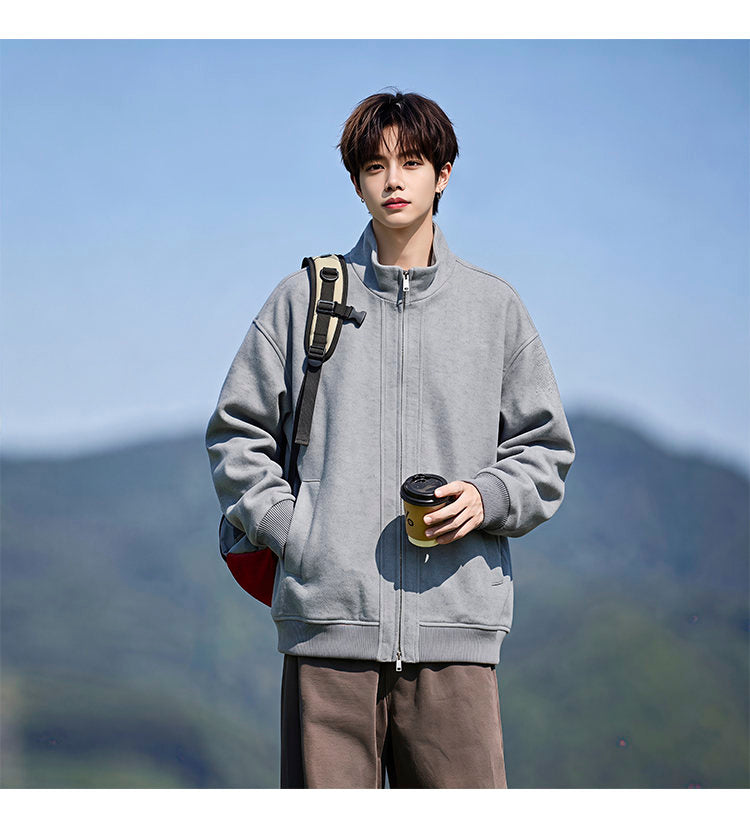 Stand-collar fleece jacket, front view of the black jacket