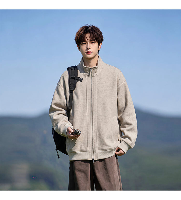 Stand-collar fleece jacket, angled view of the cream jacket