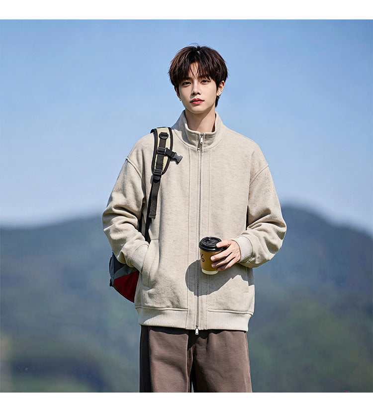 Stand-collar fleece jacket, front view of the cream jacket