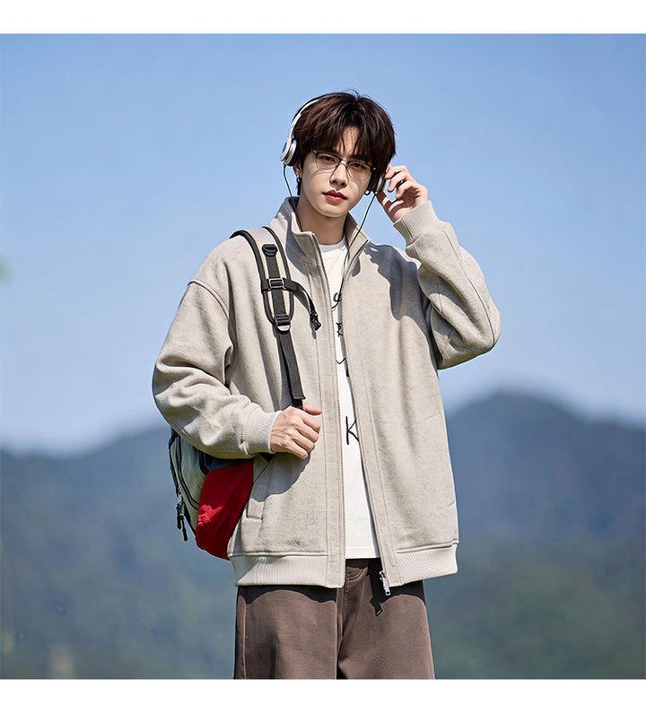 Stand-collar fleece jacket, angled view of the cream jacket