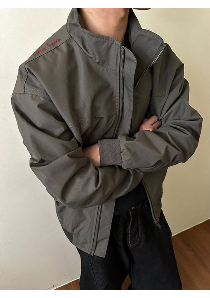 Utility bomber jacket, angled view showing the gray jacket