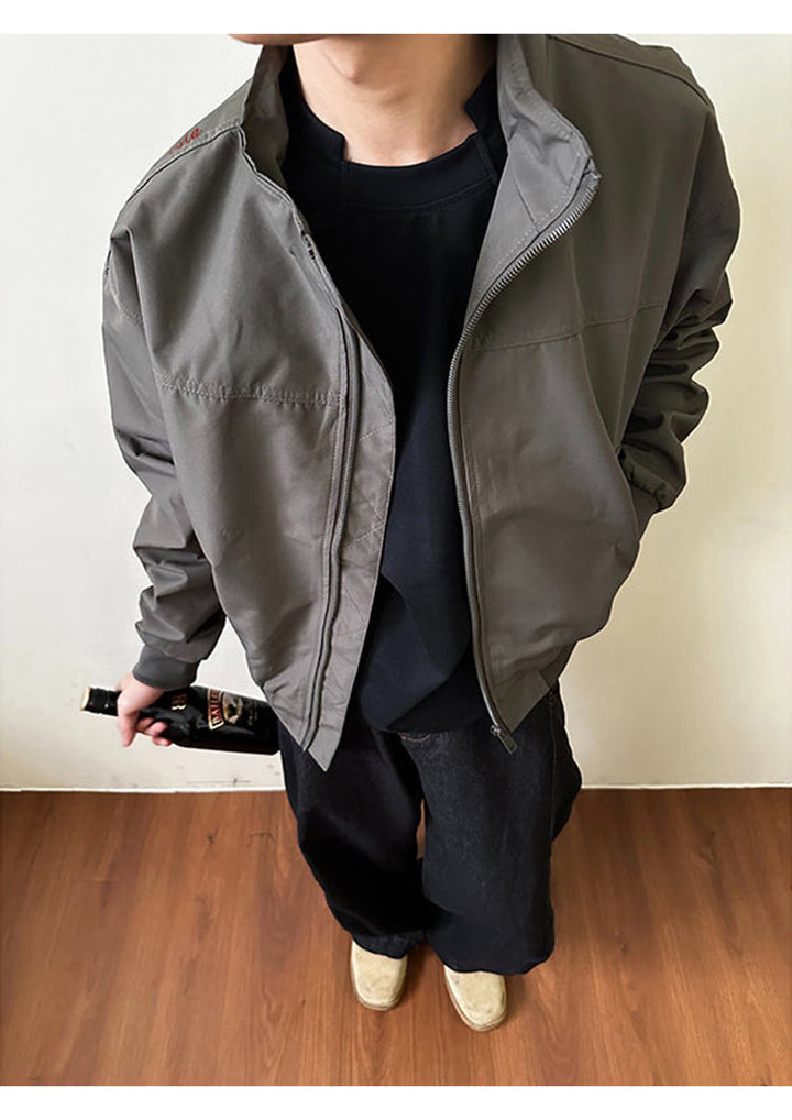 Utility bomber jacket, open front view of the gray jacket