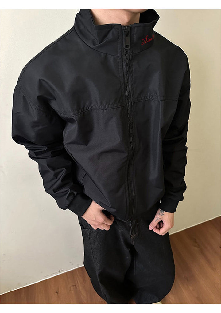 Utility bomber jacket, angled view of the black jacket