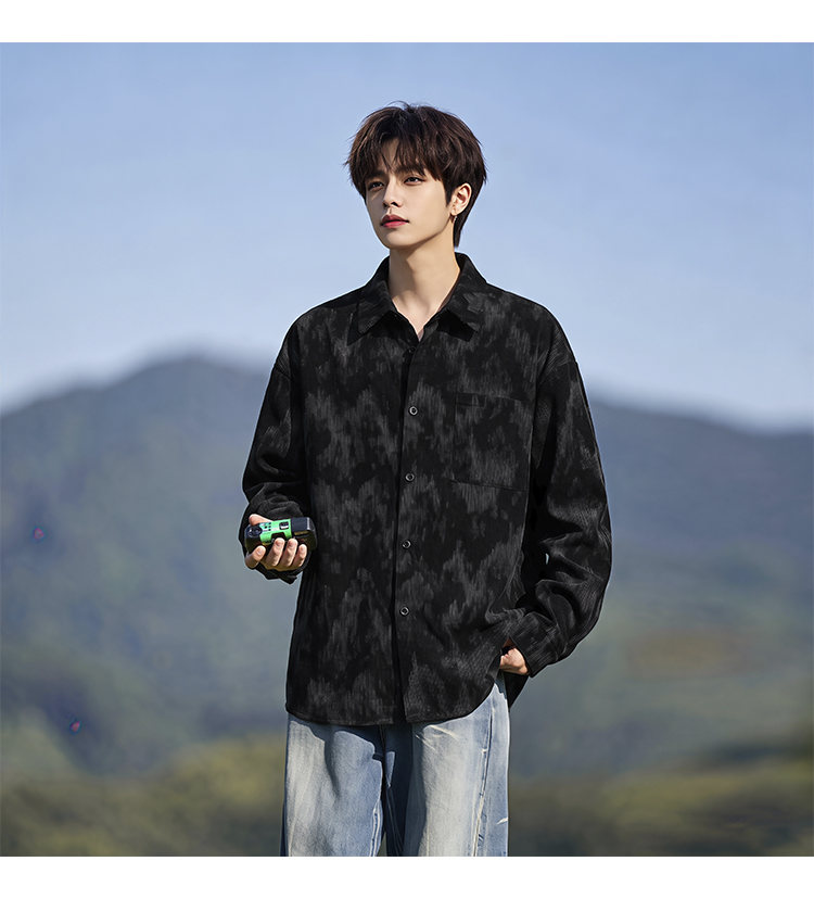 Washed long-sleeve shirt, front view showing the black marbled pattern
