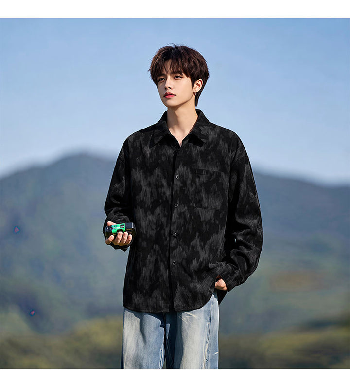Washed long-sleeve shirt, front view showing the black marbled pattern