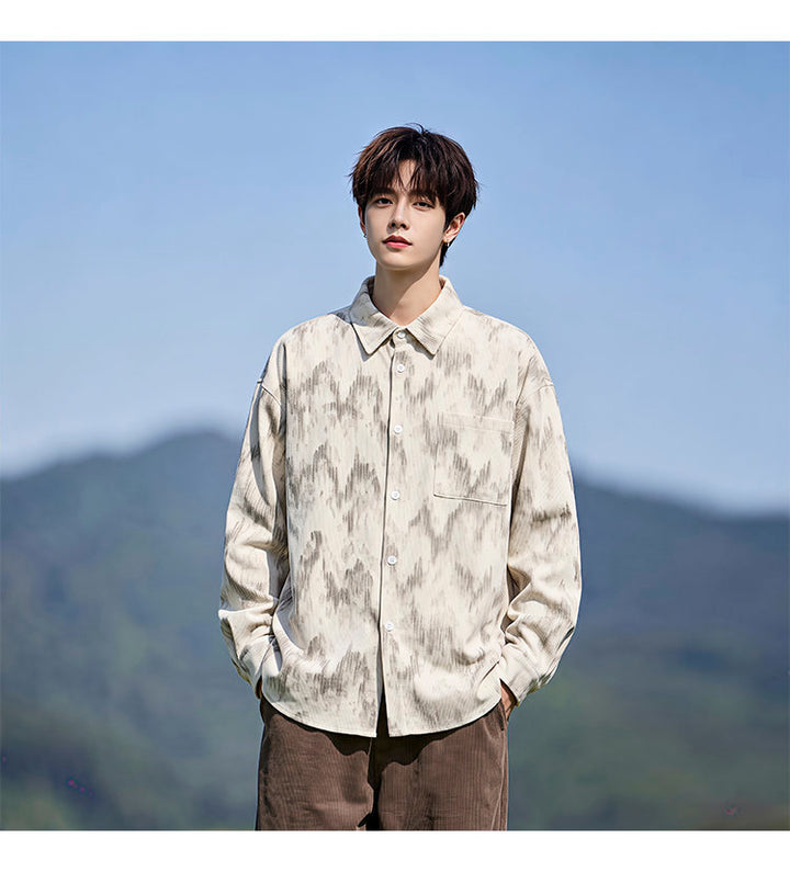 Washed long-sleeve shirt, front view showing the washed texture
