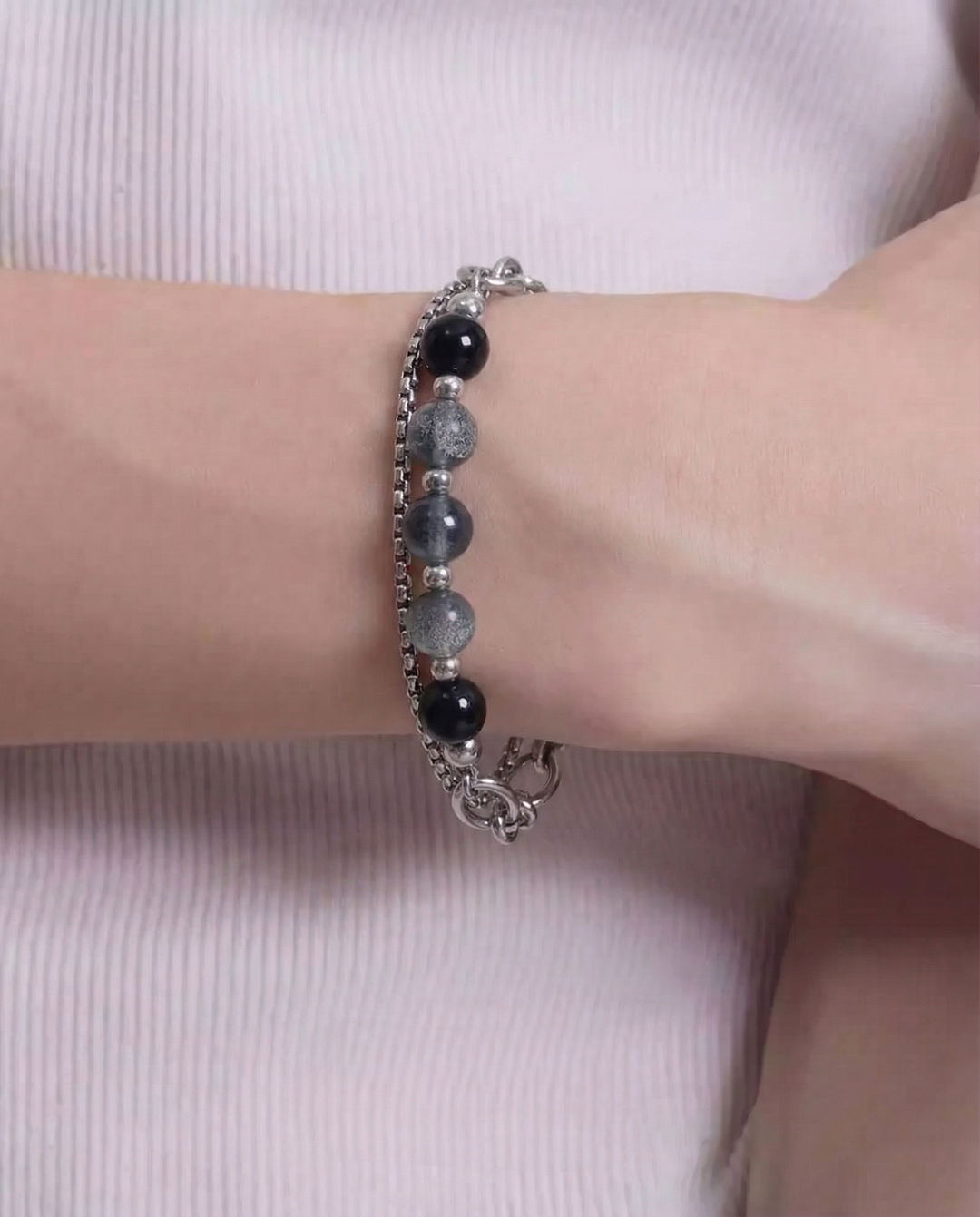 Close-up detail of Multi-style Industrial and Pearl Stackable Bracelet Set