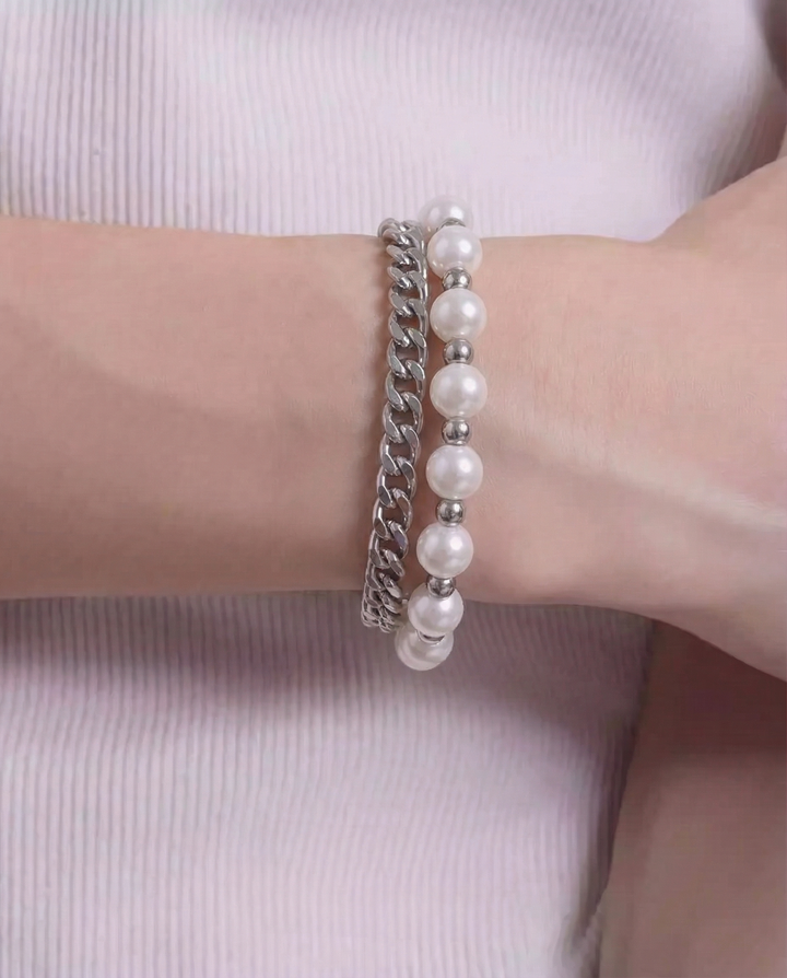 Lifestyle styling view of Multi-style Industrial and Pearl Stackable Bracelet Set